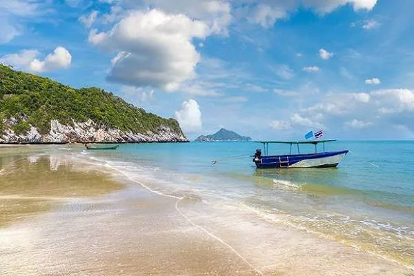 Bay with a longtail boat near Khao Sam Roi Yot